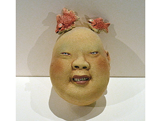 Head with fish by Esther Shimazu