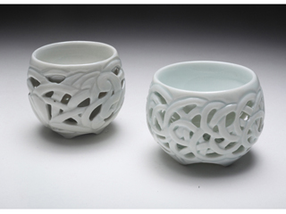 Porcelain double-walled carved sake cups by Diane KW