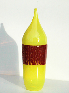 Yellow/Red Bottle by Daniel  Wooddell