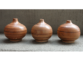 Little Brown Vases by Paul Nash