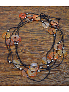 Red Agate Disks by Rita  Chung